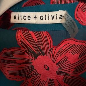 Alice + Olivia teel and red blouse